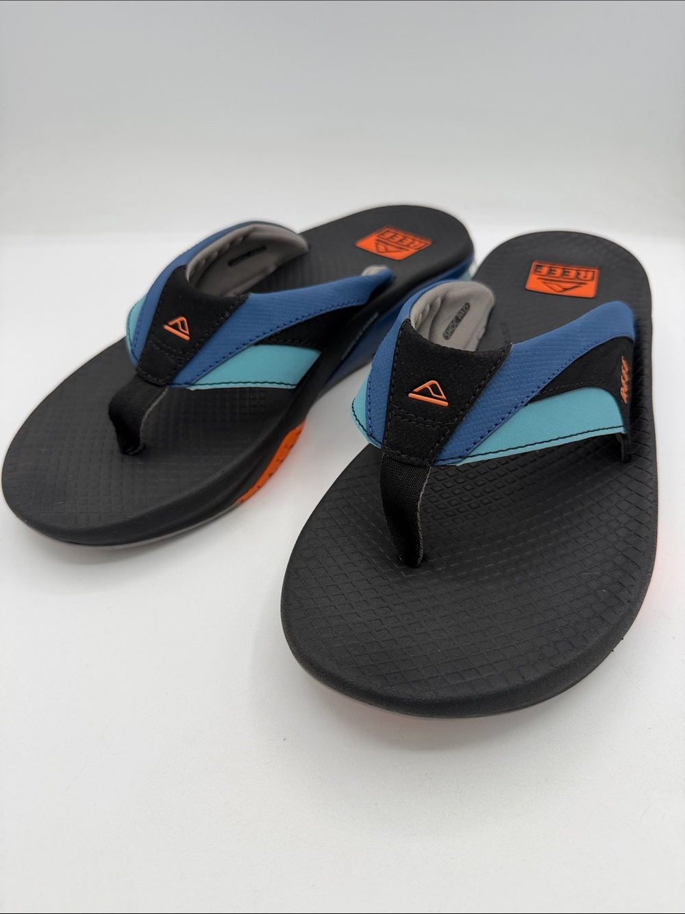 Reef Fanning +, blue/black/orange